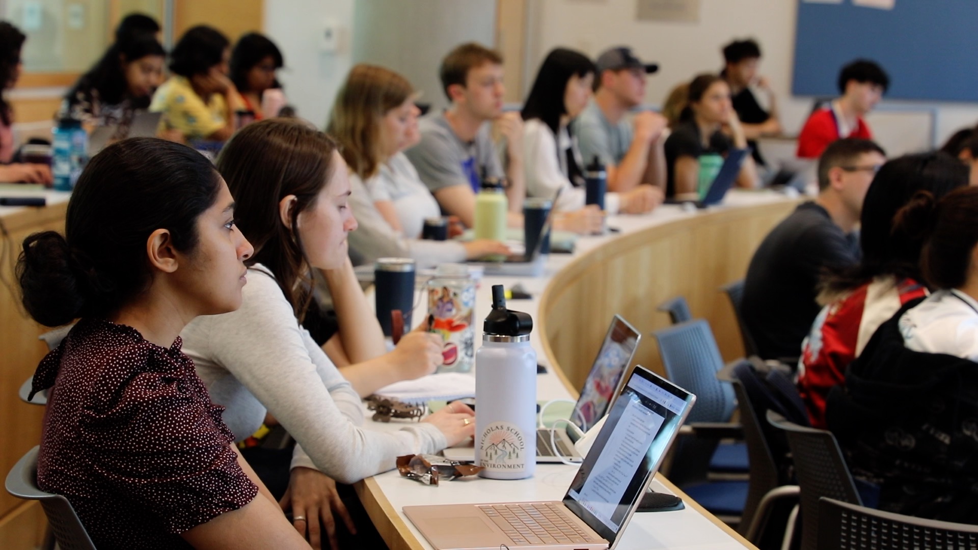 Students attending a class in Field Auditorium.